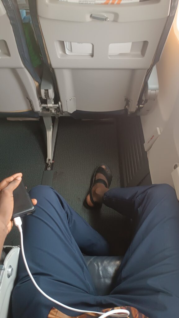 I got gigantic legroom at no extra cost, flying economy